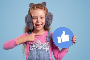 A kid using facebook messanger kids